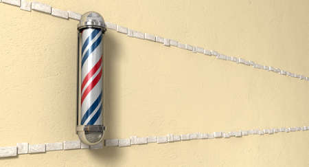 A perspective view of a regular red blue and white chrome barbers pole mounted on a yellow plaster wallの写真素材