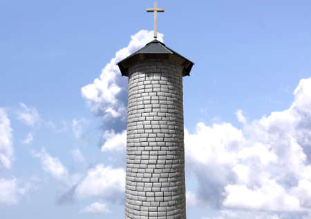 A plain stone tower turret with a wood and iron roof and a wooden crucifix on it on a blue sky backgroundの写真素材