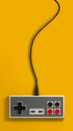 A regular vintage rectangular gaming controller with red and black buttons on an isolated yellow...