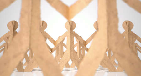 A collection of long rows of brown cardboard cutout men on an isolated white studio backgroundの写真素材