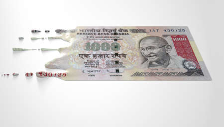 A concept image showing a regular Indian Rupee banknote that is half melted and liquified dripping...