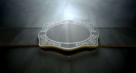 A seamed leather belt threaded through an ornate cast iron belt buckle on an isolated background