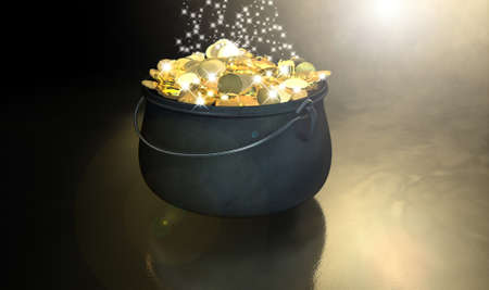 A cast iron pot filled with gold coins and magical sparkles on a dark eerie spotlit  backgroundの写真素材