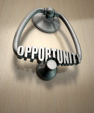 A metal door knocker with the word opportunity extruded on it munted on a wooden door background with copy spaceの写真素材