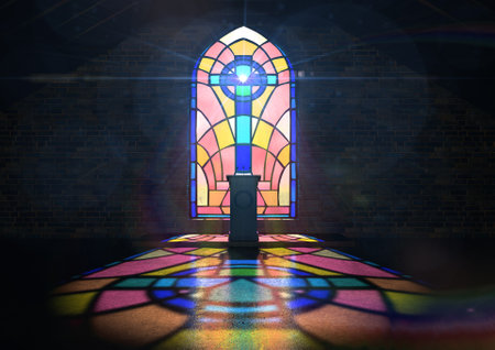 A dim old church interior lit by suns rays penetrating through a colorful stained glass window in the pattern of a crucifix reflecting colours on the floor and a speech pulpitのeditorial素材
