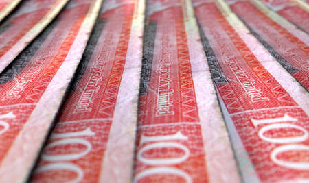 A macro close-up view showing the detail of malaysian hong kong dollar banknotes laid out and...