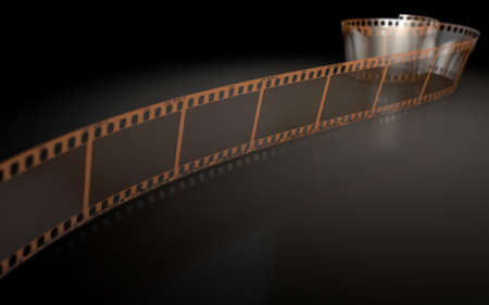 A strip of blank old vintage camera film curled up on an isolaed studio backgroundの写真素材