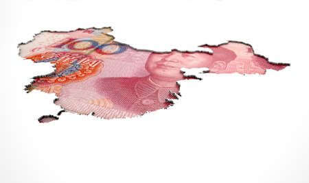 A yuan note in the shape of China recessed into an isolated white surfaceの写真素材