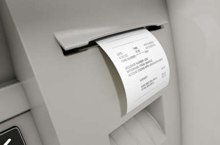 A closeup view of the slip printing section of an atm with a withdrawel receipt