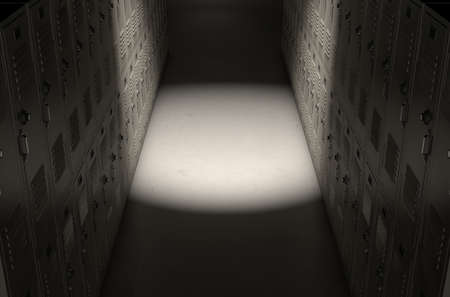 A direct top view of a row of regular school lockers in a corridor dramatically lit by a single spotlightの写真素材