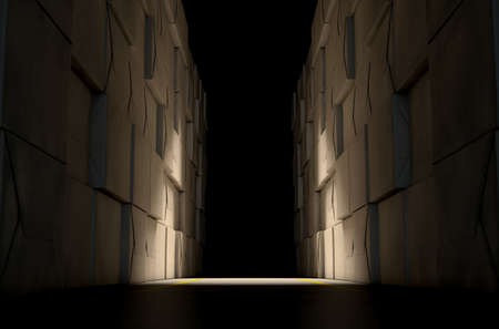 A direct top view of aisle of stacked wrapped boxes in a concrete warehouse dramatically lit by a dim spotlightの写真素材