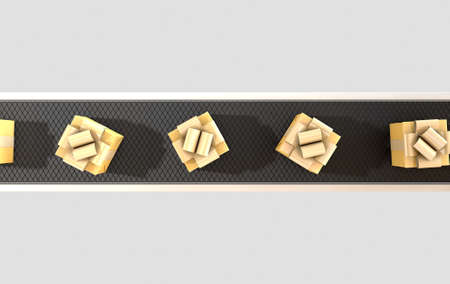 A row of wrapped gift boxes in a golden paper and ribbon on a manufacturing conveyor beltの写真素材