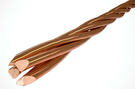 A cable made up of twisted strands of copper wire on an isolated white studio background