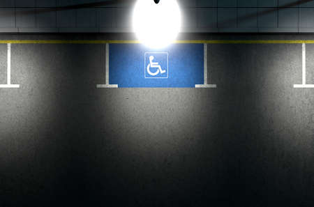 A section of a tarmac road with an empty demarcated paraplegic parking area at night lit by a street pole lightの写真素材