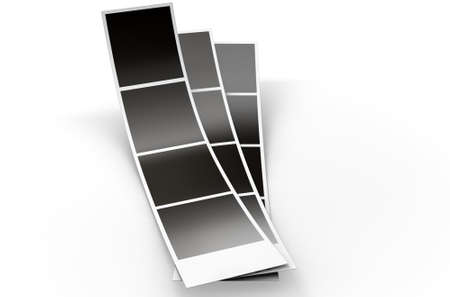A 3D render of a strip of blank photos from an instant photobooth on an isolated white studio backgroundの写真素材
