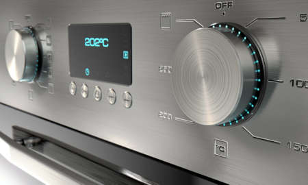 A 3D render of a closeup of the dials of a modern stainless steel oven with illuminated lights and a digital screenの写真素材