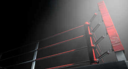 A 3D render of a modern boxing ring with a blue and red area spotlit dramatically on one corner on an isolated dark backgroundの写真素材