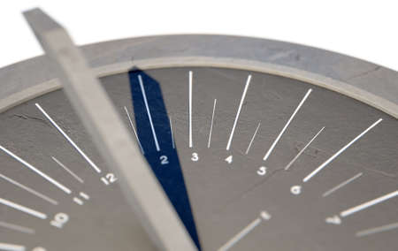 A 3D render of a sleek modern sundial clock made of stone with white markings on an isolated white...