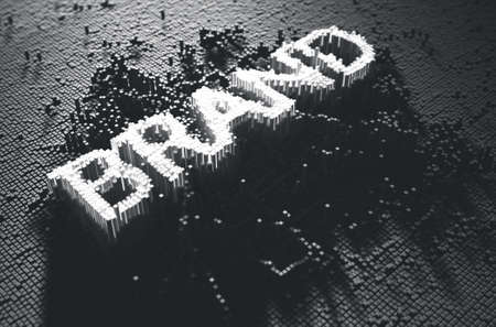 A 3D render of a microscopic closeup concept of small cubes in a random layout that build up to form the word brand illuminatedの写真素材