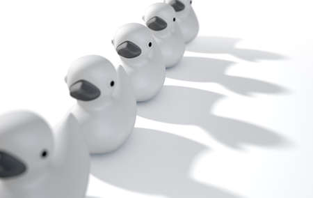 A row of organised and ready grey rubber bath duck toys on an isolated background - 3D renderの写真素材