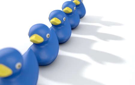 A row of organised and ready blue rubber bath duck toys on an isolated background - 3D renderの写真素材
