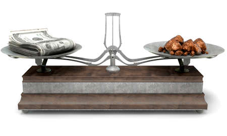 An old metal and wood two pan balance scale comparing a pile of dollar notes and a pile of copper nuggets on an isolated white background - 3D Renderの写真素材