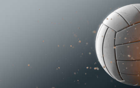 A dirty white volleyball caught in slow motion flying through the air scattering sand particles in its wake - 3D renderの写真素材