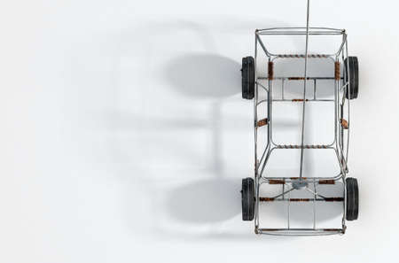 A traditional south african handmade wire toy car made out of metal and copper wire with tin cans as wheels on an isolated background - 3D renderの写真素材