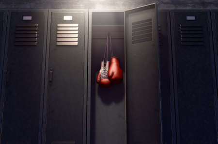 A row of metal gym lockers with one open door revealing that it has a pair of boxing gloves hanging up inside. 3D renderの写真素材