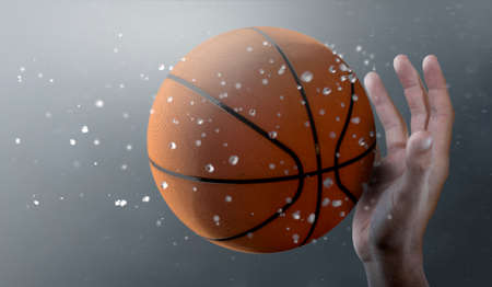 A closeup of a basket ball caught in slow motion flying through the air about to be caught by a dirty hand  - 3D renderの写真素材