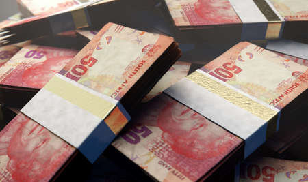 A pile of randomly scattered bundles of south african rand banknotes on an isolated background - 3D...