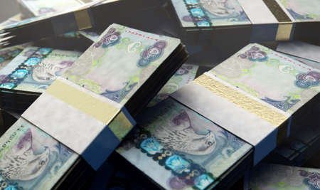 A pile of randomly scattered bundles of Dirham banknotes on an isolated background - 3D render