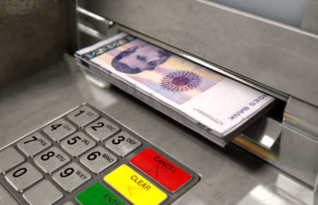 A closeup view of an atm facade with an illuminated sceen and keypad and a wad of norwegian kroner...