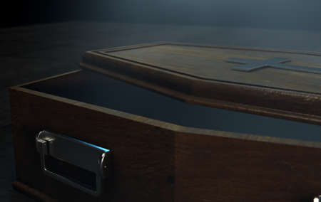 A slightly open empty wooden coffin with a metal crucifix and handles on a dark ominous background -...