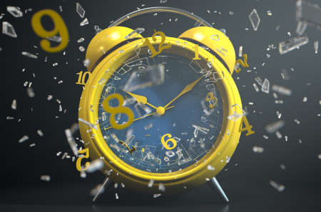 A yellow vintage desk clock with its numbers smashing through the glass screen on a dramtic spotlit...