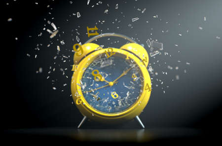 A yellow vintage desk clock with its numbers smashing through the glass screen on a dramtic spotlit...