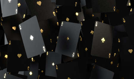 An array of reflective black casino ace cards with gold markings floating in the air on a dark...