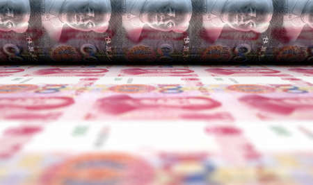 A concept image showing a sheet of Chinese yuan renminbi notes going through a roller in its final...