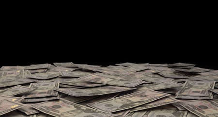 A close-up view of a scattered pile of US dollar banknotes - 3D render