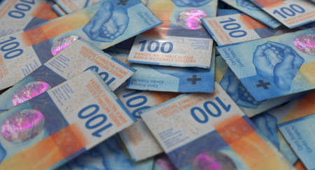 A close-up view of a scattered pile of swiss franc banknotes - 3D render
