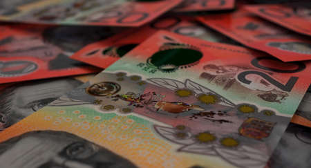 A close-up view of a scattered pile of australian dollar banknotes - 3D renderの写真素材