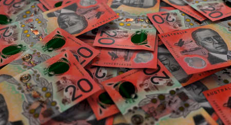A close-up view of a scattered pile of australian dollar banknotes - 3D renderの写真素材