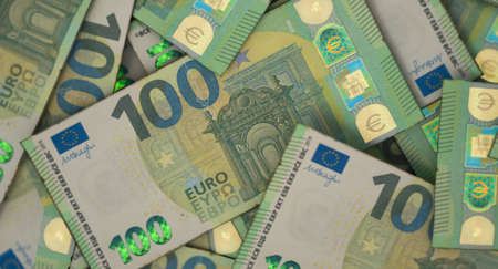 A close-up view of a scattered pile of European Euro banknotes - 3D render