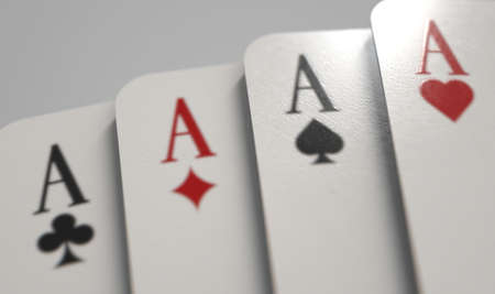 A close up view of a fanned out suit of four casino aces playing cards on a light background - 3D...