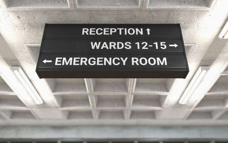 A hospital directional sign mounted on a cast concrete ceiling highlighting the way towards the ER ward - 3D renderの写真素材
