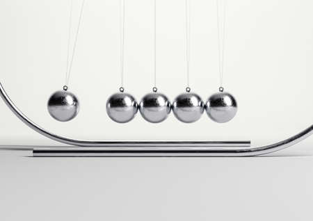 A stylized newtons cradle with balls in motion suspended from a semi circular arch framework - 3D...