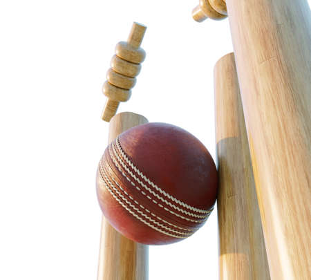 Wooden cricket wickets with dislodging bails on an isolated white background - 3D renderの写真素材