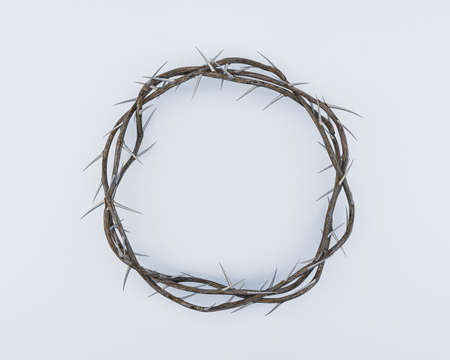 Branches of thorns woven into a crown depicting the crucifixion on an isolated white background - 3D renderの写真素材