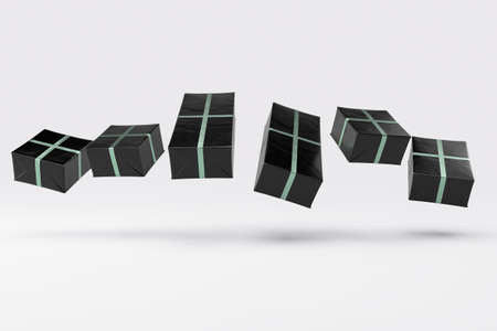 A floating collection of different sized rectangular gift boxes wrapped in black gift wrap paper...