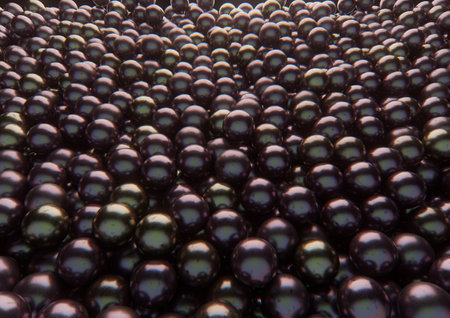 An array of black shiny pearls spread out to form an solid background - 3D renderの写真素材